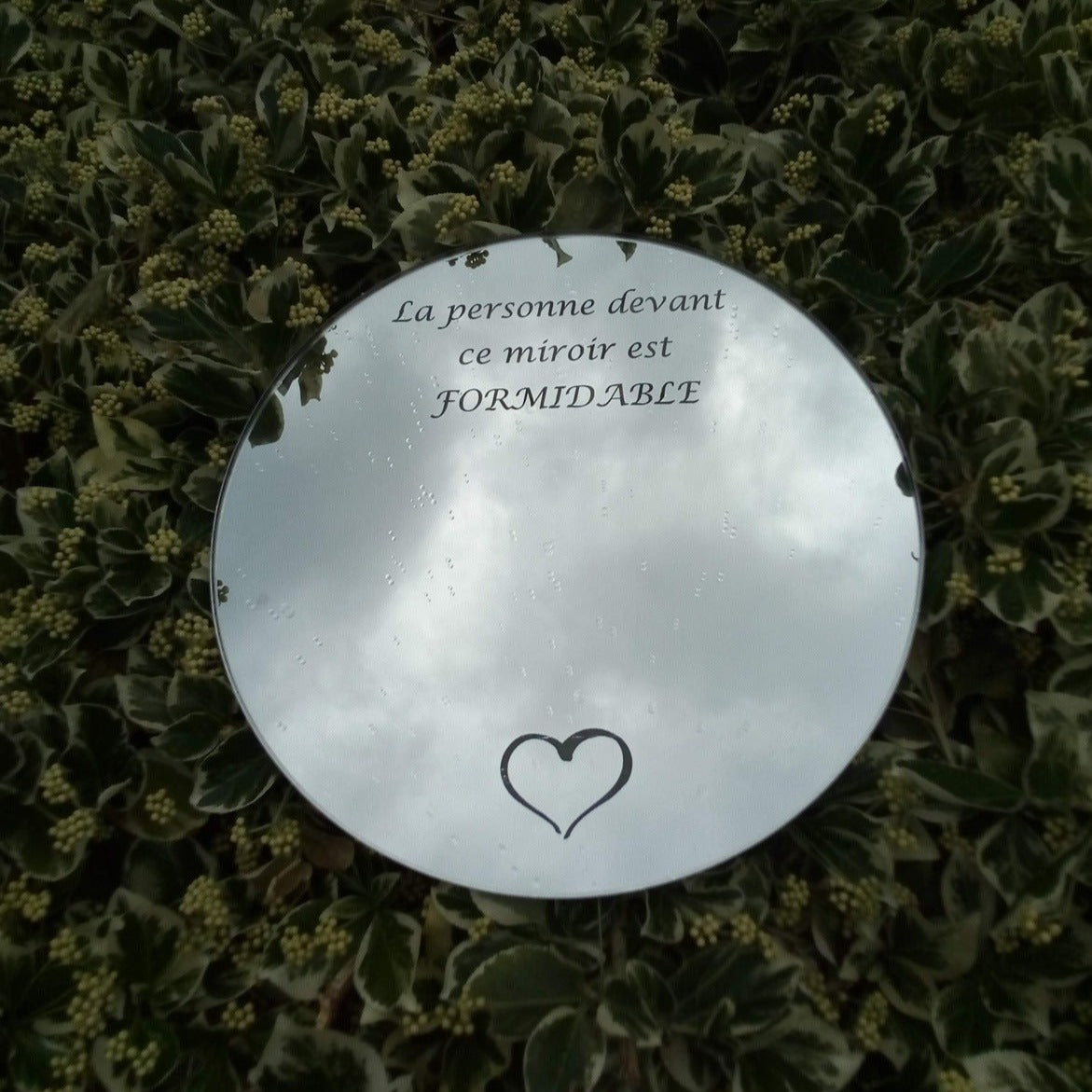 "Miroir gravé au laser"